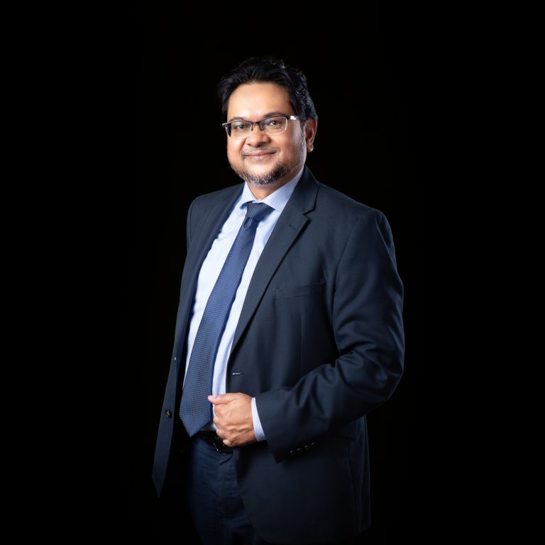 Dr. Nishan de Mel
